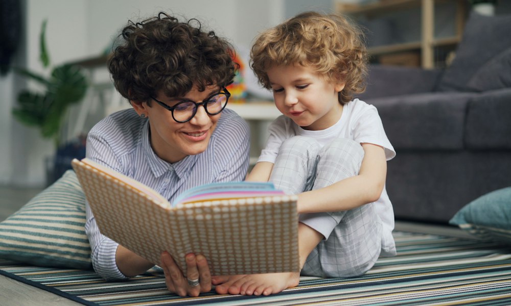 A calm, sensory-friendly corner set up at home with soft textures and quiet activities