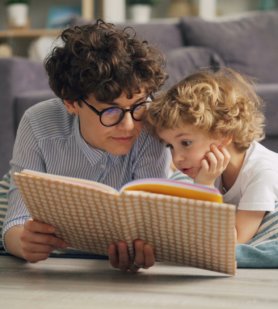 A 5 Pillars therapist working closely with a child